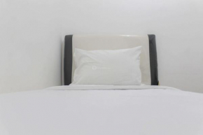 Minimalist and Enjoy 2BR at Bassura Apartment near Bassura Mall By Travelio